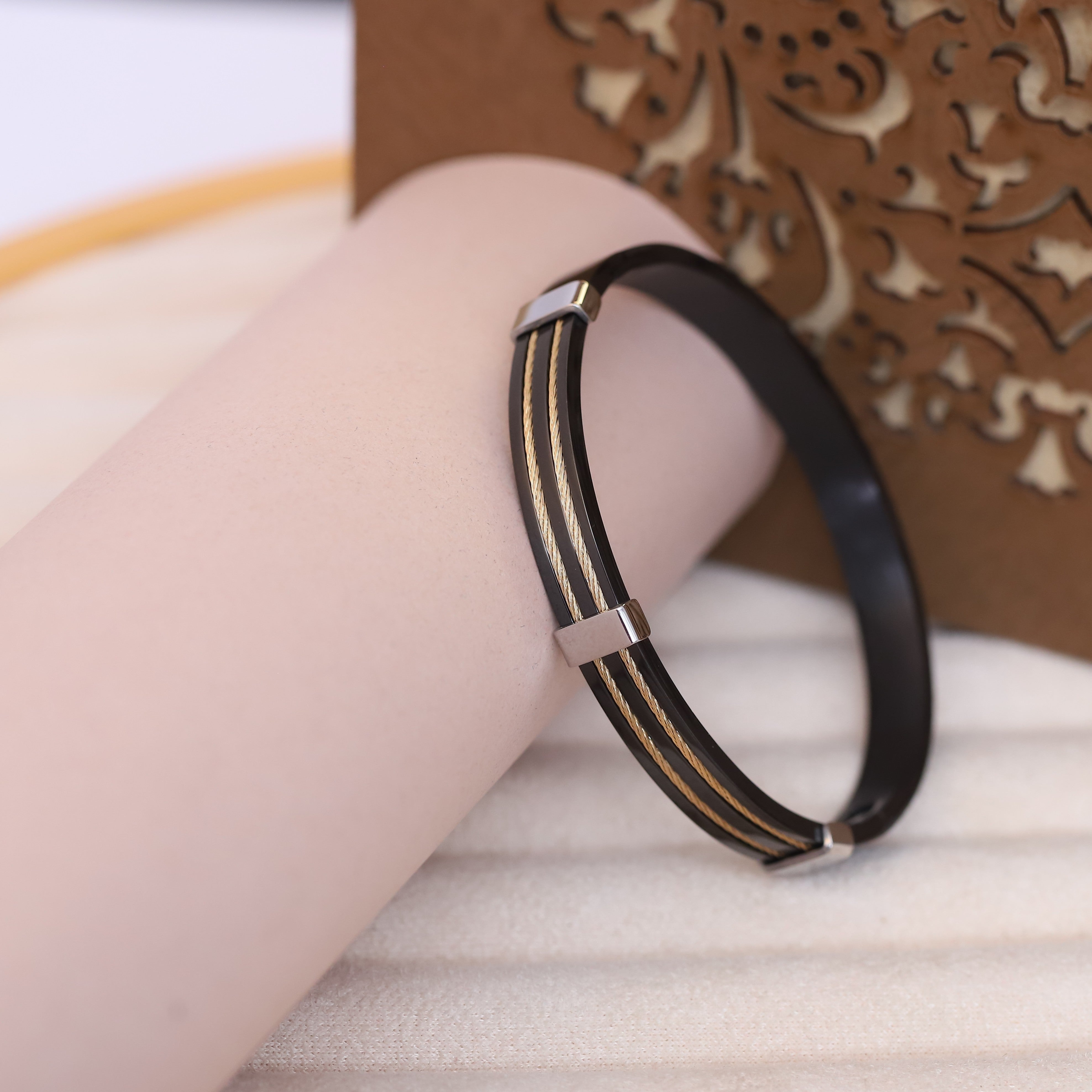 Luxury Men’s Black Bracelet with Dual Golden Cable Detailing and Silver-Tone Accents – Modern Designer Bangle Style for Stylish & Confident Look