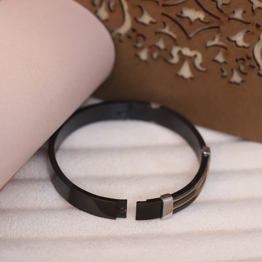 Luxury Men’s Black Bracelet with Dual Golden Cable Detailing and Silver-Tone Accents – Modern Designer Bangle Style for Stylish & Confident Look